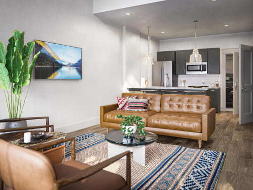 a living room with a couch and a table