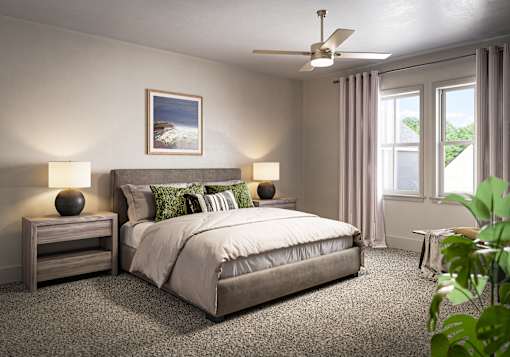 a bedroom with a bed and a ceiling fan