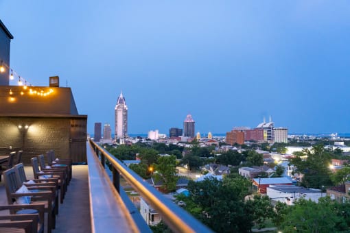 a view of philadelphia from a balcony at dusk