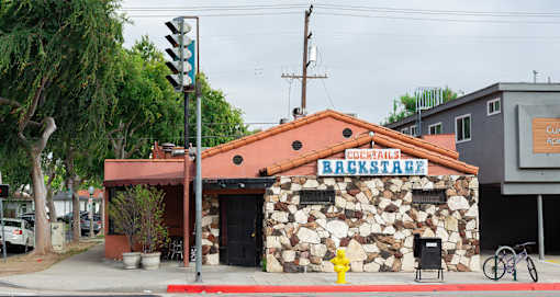 Backstage Bar and Grill is a local haunt, great for drinks and karaoke
