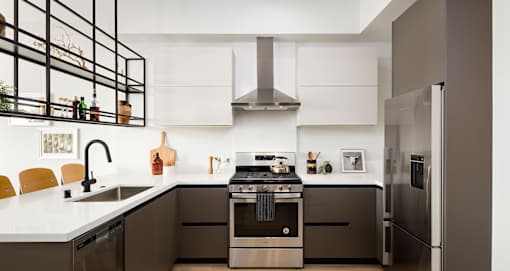 Spacious kitchens with Quartz countertops and stainless steal appliances