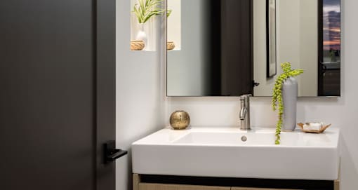 Bathrooms with beautiful built-ins and lighting