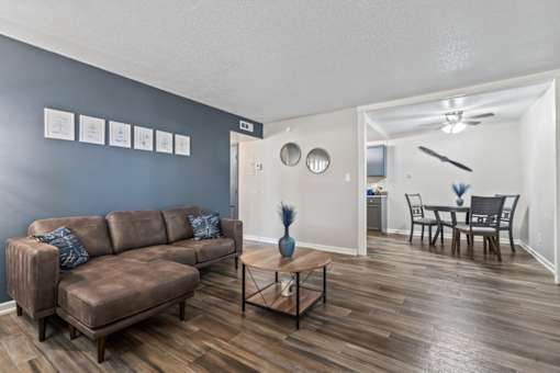 a living room with a couch and a table