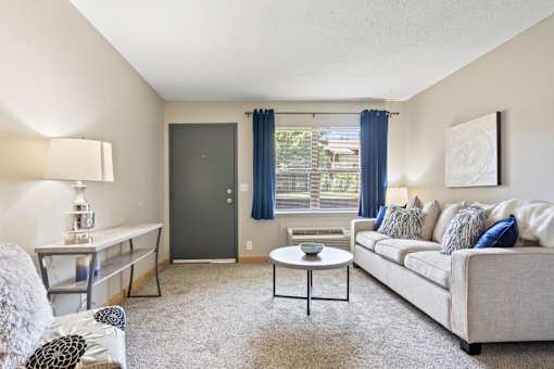 a living room with a couch and a coffee table