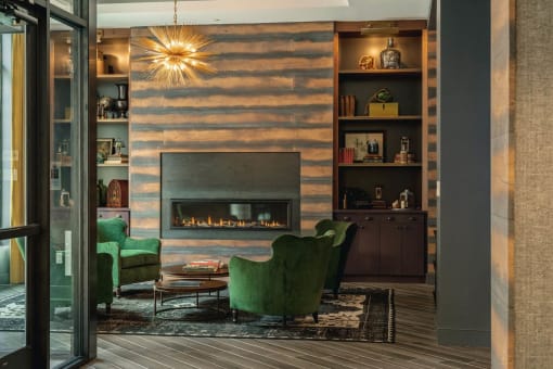 Cozy Relaxing Library Room With Books And Fireplace at Holmes Beverly, Beverly, 01915