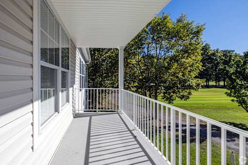 Large balcony facing the Blue Heron Pines Golf Course