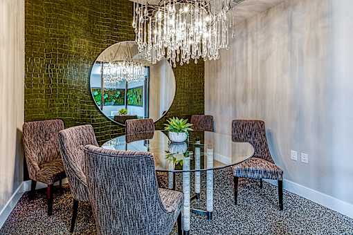 A dining room with a glass table and chairs.at Tiffany Flats, Ohio, 43231