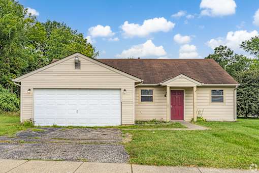 Enjoy an attached garage and yard with your rental home at Cabot's Mill.