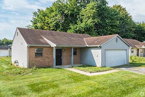 Enjoy an attached garage and yard with your rental home at Cabot's Mill.