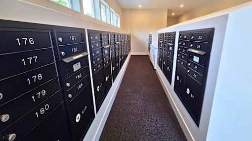 Secure mailboxes and package area at Greenwood Commons.