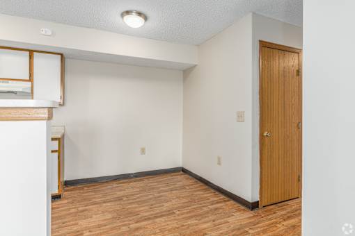 Dining area near the kitchen at River Valley Apartments.