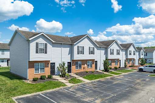 Entry-way and patio view of apartments at River Valley in Lancaster, OH.