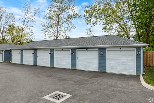 A row of garage doors are closed.