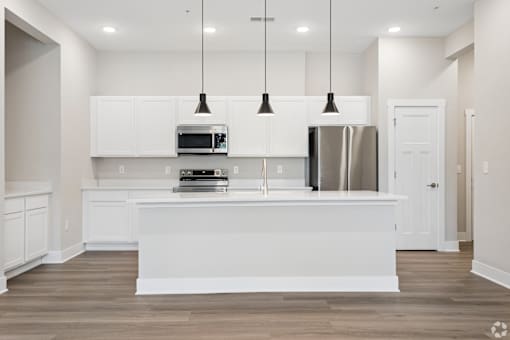 Kitchen with appliances of an apartment home.
