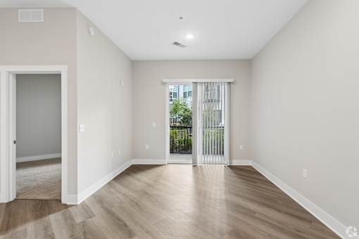 Large living area with patio/balcony.