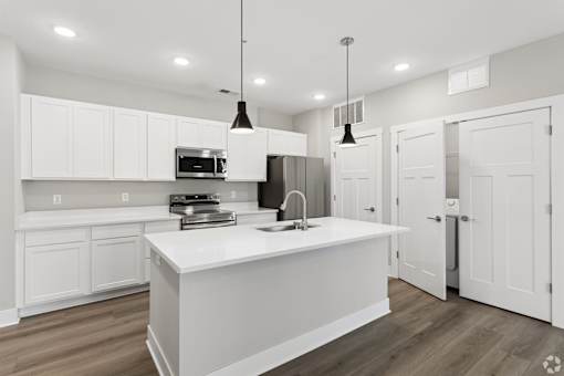 Large kitchen with island of an apartment home at Tiffany Flats.