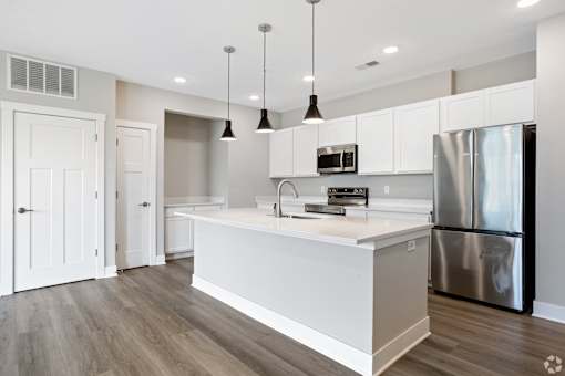 Kitchen with appliances of an apartment home.