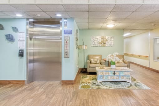 elevator bay with comfortable seating nearby