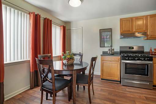 Fully Equipped Kitchens And Dining at The Apartments at Elmwood Terrace, Frederick, Maryland