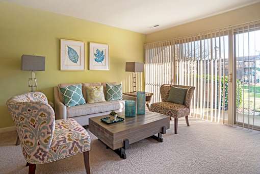 Well Lit Living Room at The Apartments at Elmwood Terrace, Maryland, 21702
