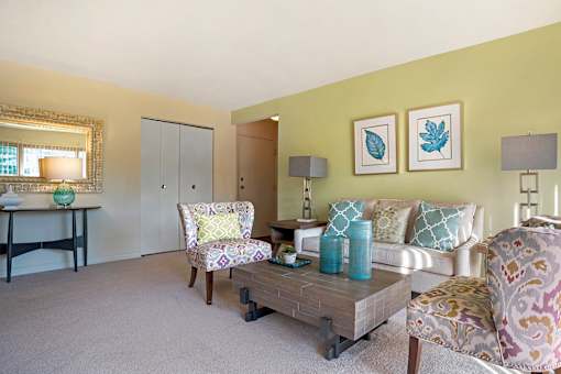 Warm And Inviting Living Room at The Apartments at Elmwood Terrace, Frederick, MD, 21702