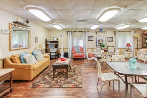 Lobby area with ample seating and overhead lighting at Casa San Pablo