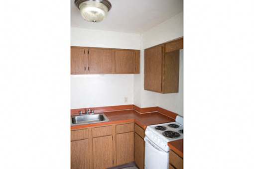 The Roosevelt Apartments – Kitchen - Dining – Appliances Included – Gas Range - Storage - 24 Hour Emergency Maintenance – Water/Trach Pickup Included - Storage - Ask for a Tour – Pet Friendly - Interc