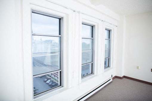 The Roosevelt Apartments – Living Room – Dining – Buffalo Area – Appliances Included - 24 Hour Emergency Maintenance – Pet Friendly – Ask for a Tour - Cable Ready – Carpeting - Intercom Access