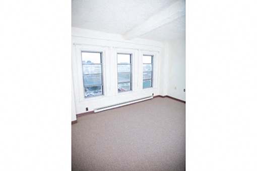 The Roosevelt Apartments – Living Room – Dining – Buffalo Area – Appliances Included - 24 Hour Emergency Maintenance – Pet Friendly – Ask for a Tour - Cable Ready – Carpeting - Intercom Access