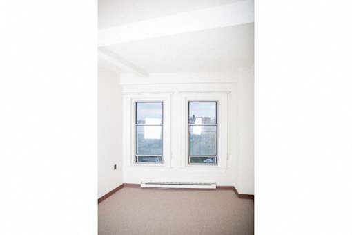 The Roosevelt Apartments - One-bedroom, One-Bath Units – Buffalo, New York – High-rise - Closet – Master - Storage – Carpet - Handrails - Ask for a Tour – Pet Friendly