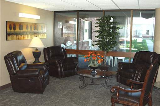 Westchester Park Apartments – Living Room – Kenmore Area – Efficient Appliances Included - 24 Hour Emergency Maintenance – Pet Friendly – Ask for a Tour - Cable Ready – Carpeting - Intercom Access