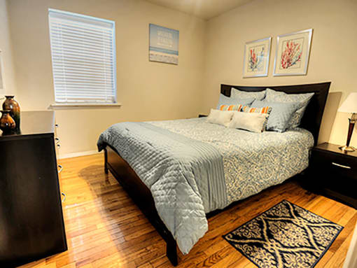 Furnished bedroom at Waters Mark Apartment Homes, Gulfport