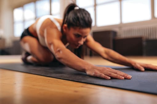 Fitness center with yoga and stretching area at 28 Austin St, Newton, Massachusetts