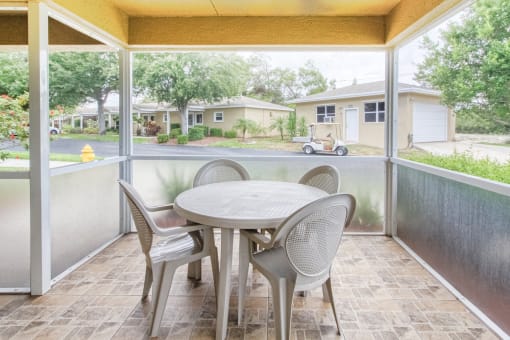 Outdoor patio with table and chairs