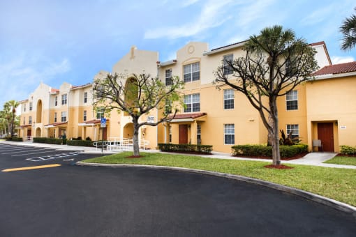 lush landscaping and well-kept sidewalks at Crystal Lake Apartments