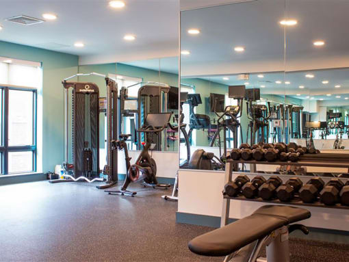 Beverly MA Apartments - Holmes Beverly -State-Of-The-Art Fitness Center with Equipment, Weights, Machines, and Large Mirrors