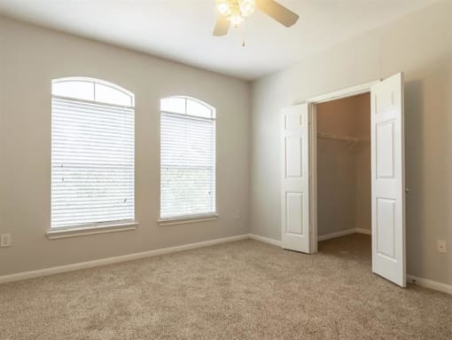 bedroom with walk-in closet