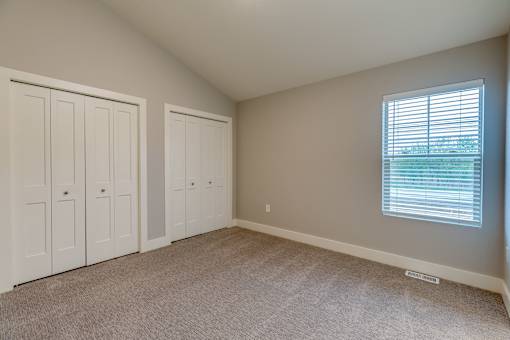 Bedroom at the Quarry Apartments in DeWitt Michigan