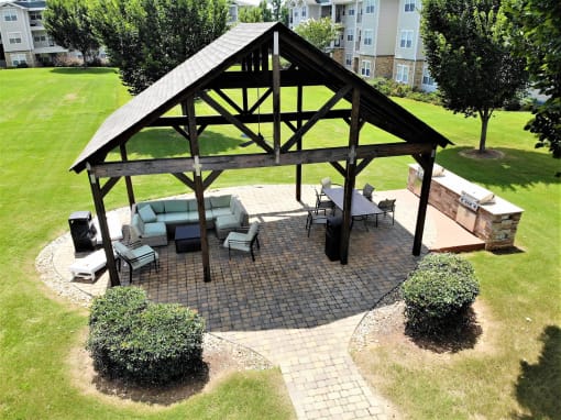 Madison AL Apartments - Arch Street - Grassy Courtyard with a Lounge and Grill Area