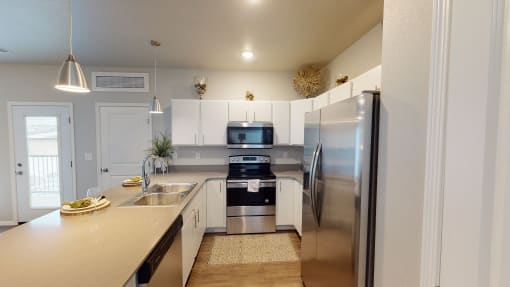 Granite Countertop Kitchen at Upscale Living at the Grand off 45th, North Dakota