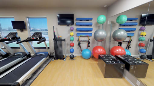 fitness room at Upscale Living at the Grand off 45th, North Dakota
