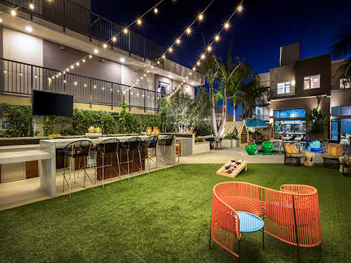 Outdoor lounge area and pool at Vida North Park, San Diego, California