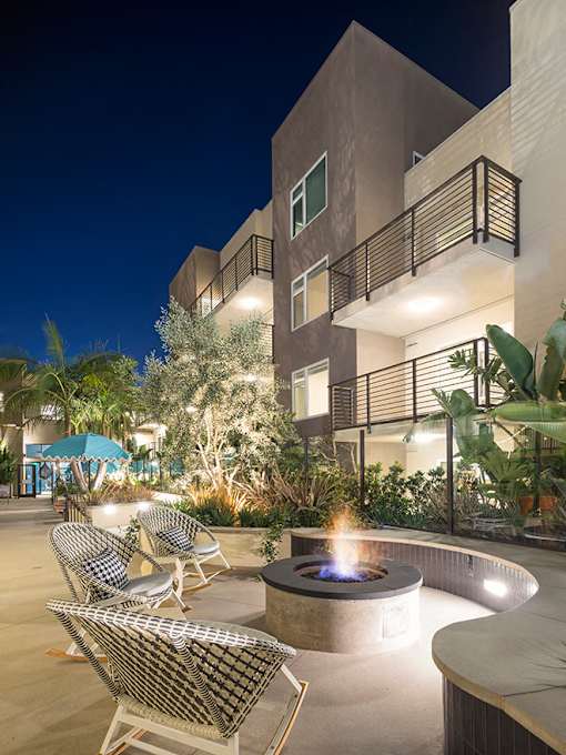 Outdoor lounge with fire pit at Vida North Park, San Diego, CA, 92104