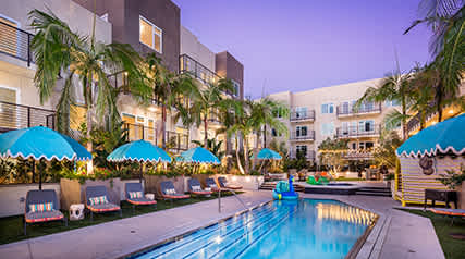 Outdoor lounge area, pool and hot tub at Vida North Park, San Diego, California
