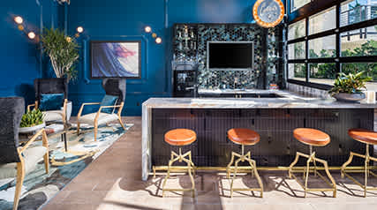 Clubroom with bar and lounge area at Vida North Park, San Diego, CA