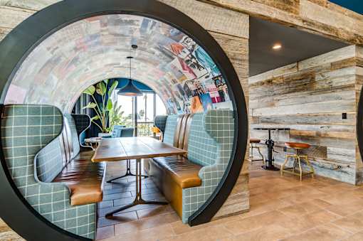 Clubroom with lounge area at Vida North Park, San Diego, California