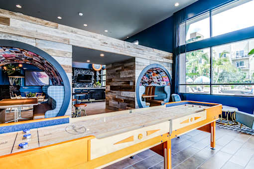 Clubroom with gaming and lounge area at Vida North Park, California, 92104