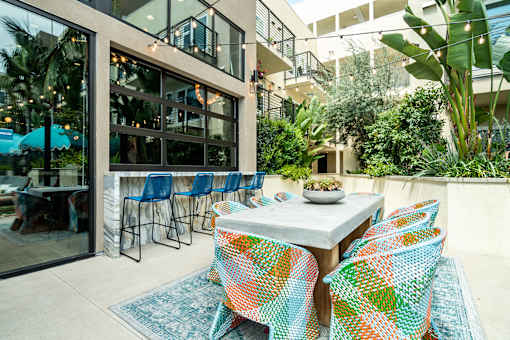 Outdoor dining area at Vida North Park, San Diego, CA, 92104