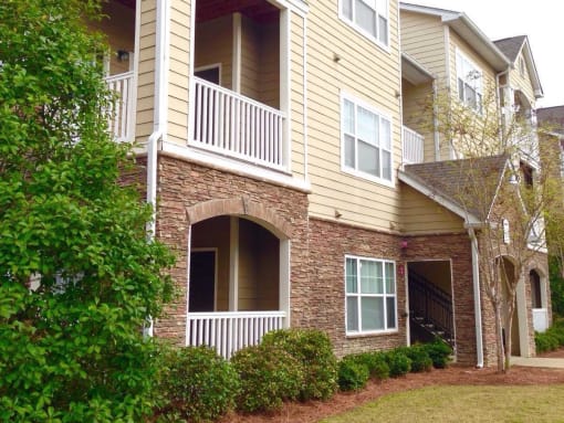 lush landscaping around apartment exterior