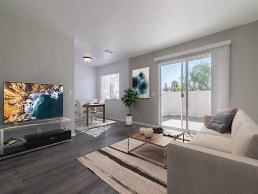 a living room with a couch and a tv